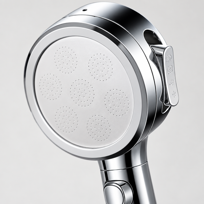 Close-up detail of the Yuba handheld shower head surface and finish