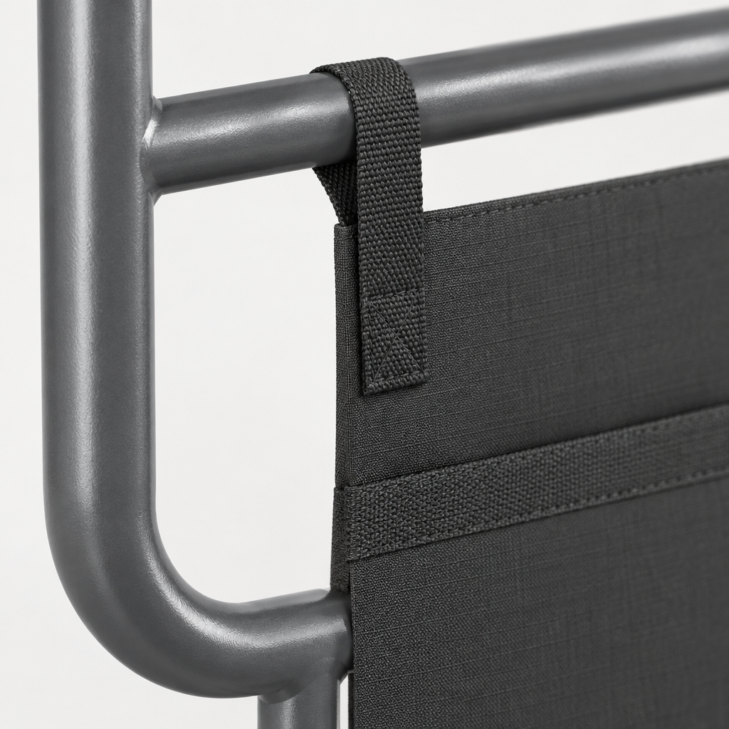 Close-up detail of the folding bed rail frame and storage pocket