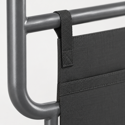 Close-up detail of the folding bed rail frame and storage pocket
