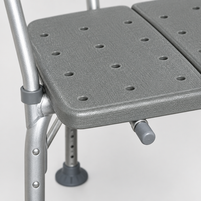 Close-up detail of the shower chair seat surface and leg construction