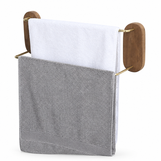Brass single towel bar rack on a white studio background