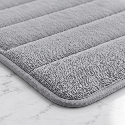 Close-up detail of the memory foam bath mat pile texture