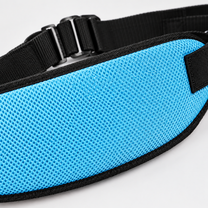 Close-up detail of the breathable mesh restraint strap weave and buckle