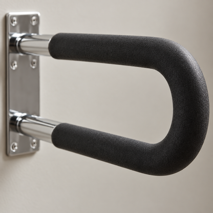 Close-up detail of flip-up grab bar hinge and mounting plate