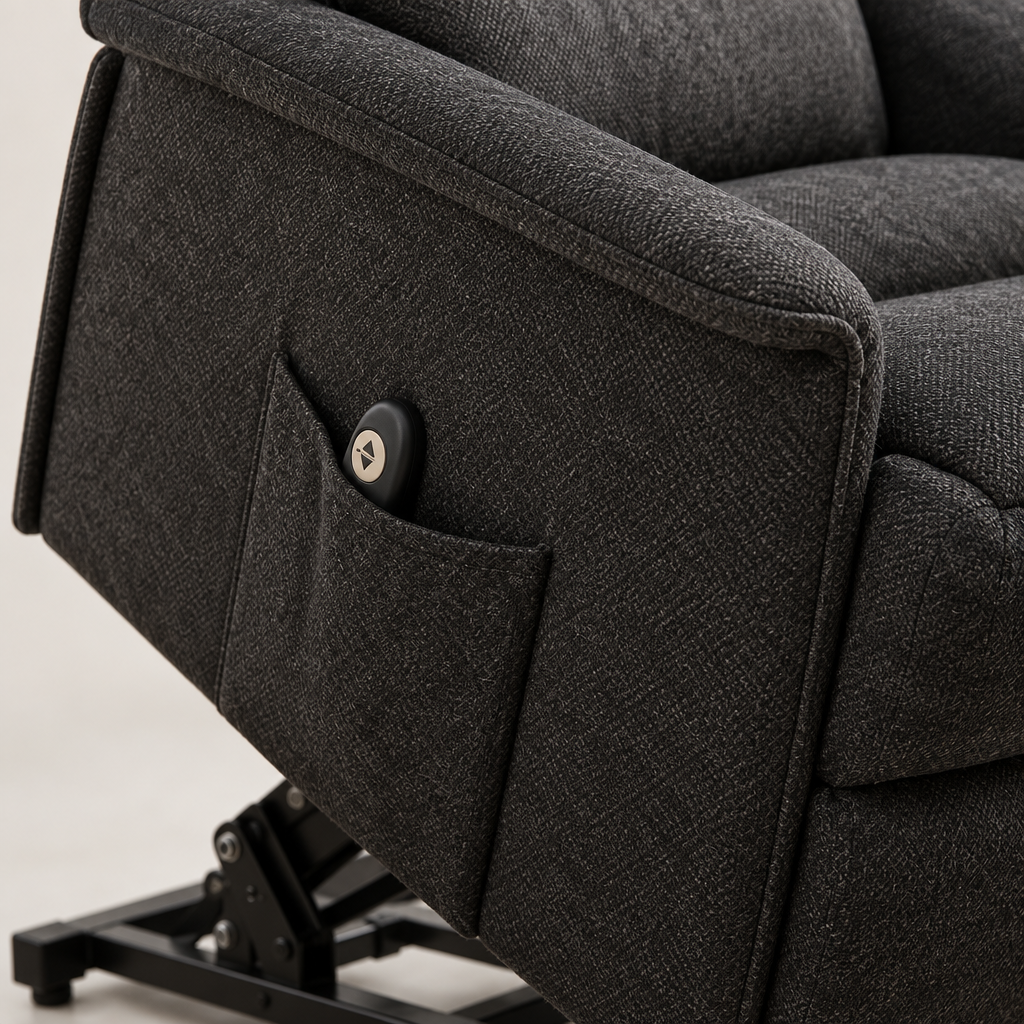 Close-up detail of black recliner upholstery texture and seam
