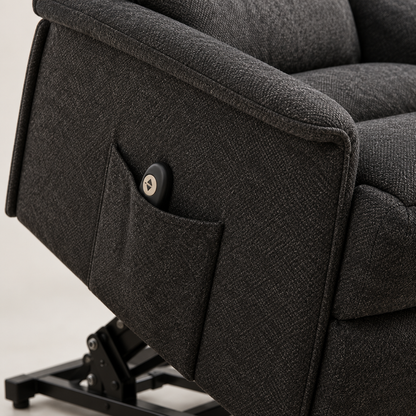 Close-up detail of black recliner upholstery texture and seam